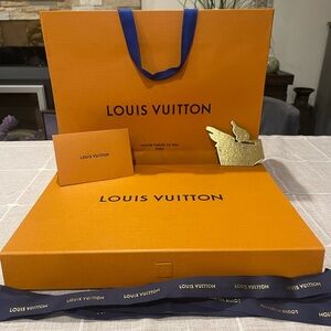 Brand new Louis Vuitton store bag and box